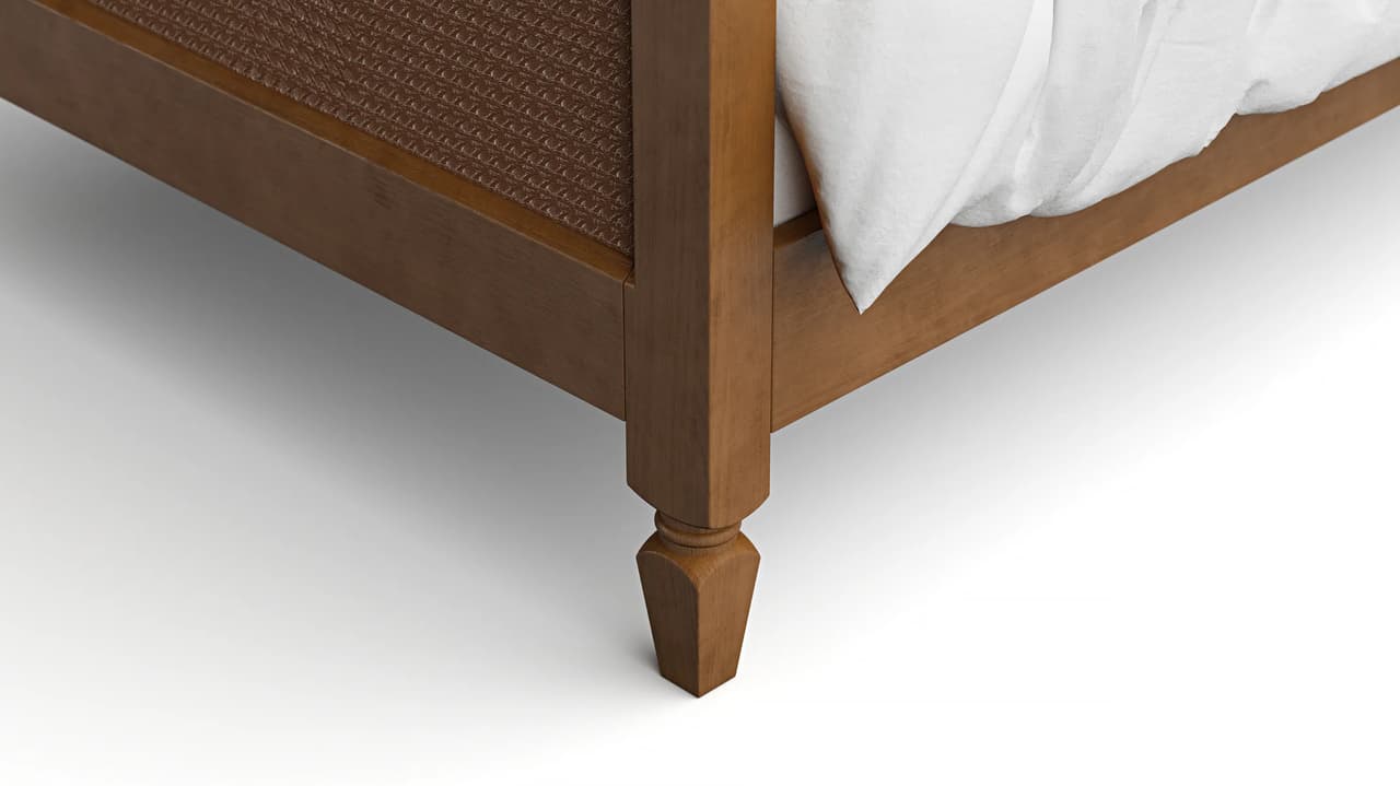 Close-up studio render highlighting the carved wooden bed leg and woven frame texture