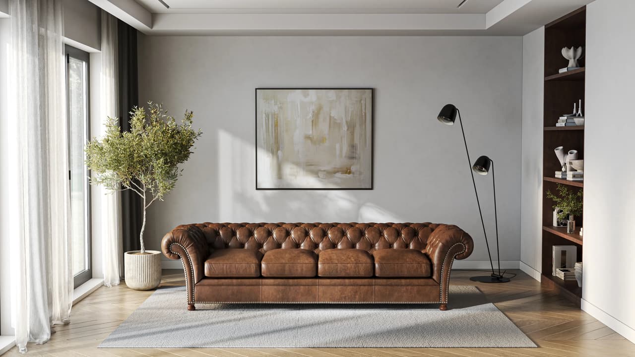Front view of a classic brown Chesterfield sofa in a sunlit modern living room, showcasing highly detailed cgi sofa rendering.