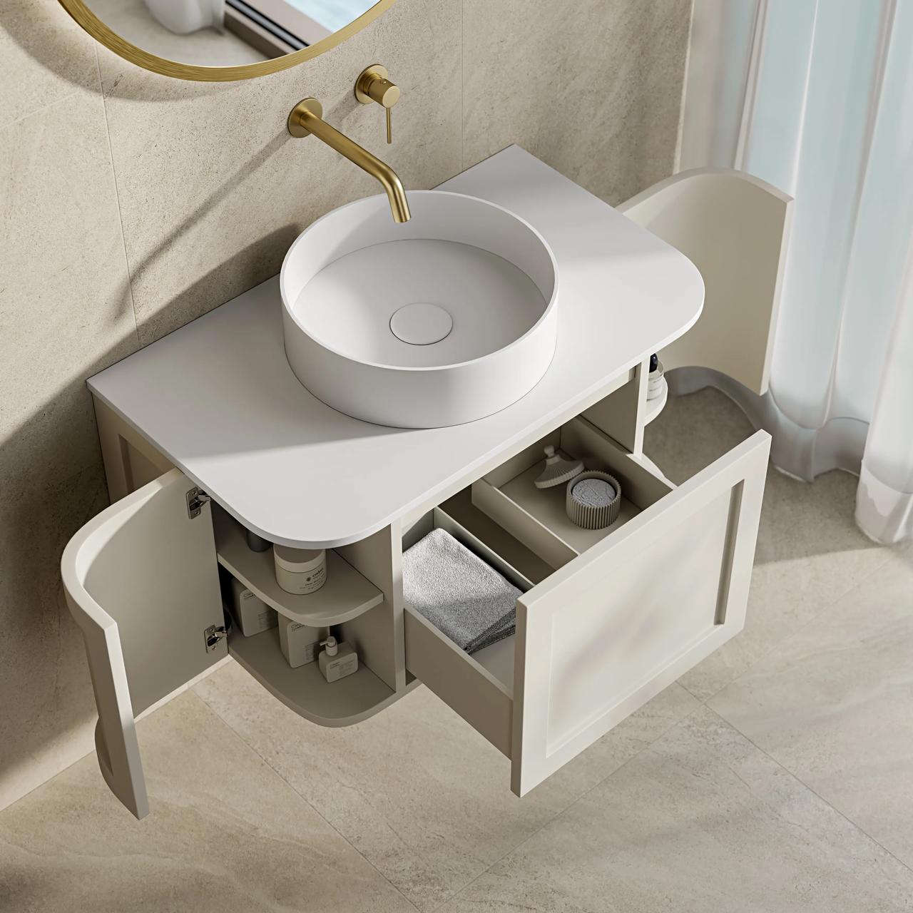 A top-down view of a modern 3d bathroom vanity featuring soft curved edges and a matte white finish. The side doors and central drawer are pulled open to reveal organized internal shelves with folded towels and toiletries, complemented by a round vessel sink and a wall-mounted brushed gold faucet.