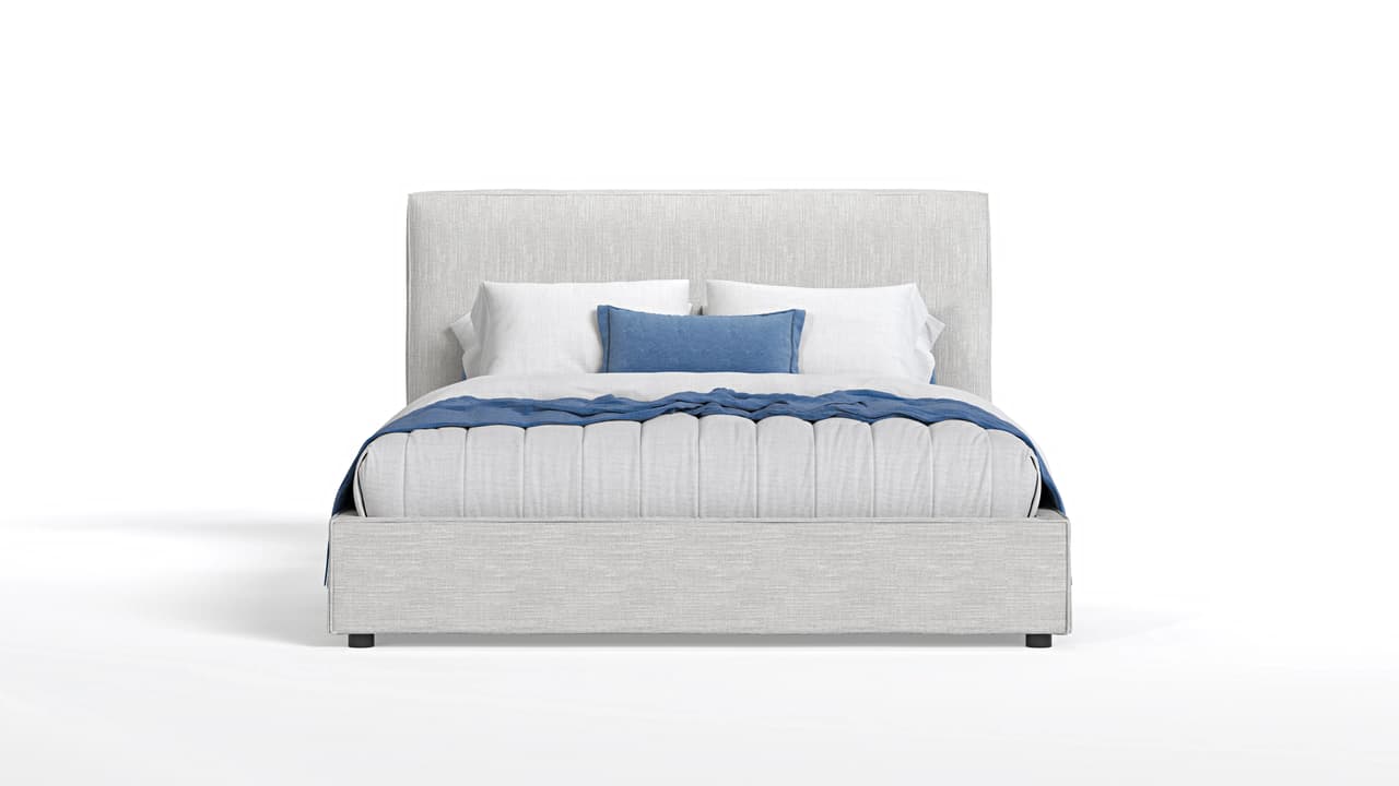 Front view silo render of a modern grey upholstered bed with pillows and blue blanket accent