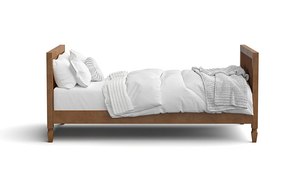 Side view studio render of a wooden frame bed with woven details and cozy white bedding