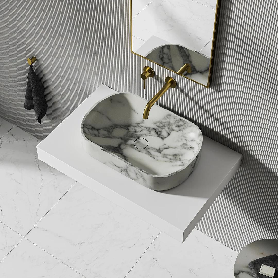 High-angle view of a modern floating white vanity with a marble vessel sink and a wall-mounted brass faucet against a ribbed wall, demonstrating high-end 3d bathroom rendering.