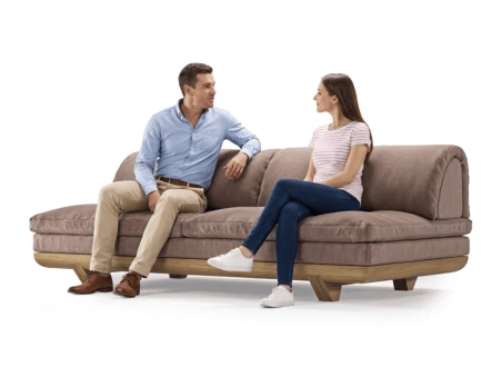 Studio render of the 3d sofa model featuring two AI-generated people sitting and talking, demonstrating furniture scale and human interaction.