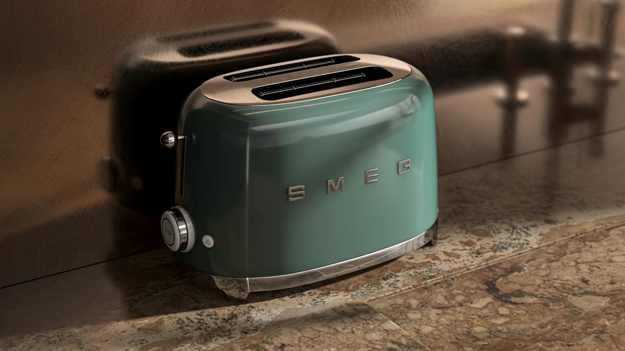 A close-up shot of a pastel green retro-style 3d toaster resting on a glossy, textured brown stone countertop. Warm lighting highlights the toaster's chrome details and creates sharp reflections against the blurred, dark kitchen background.